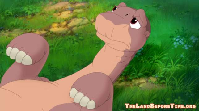 The Land Before Time Wallpaper Background Littlefoot Lying On Back in Grass